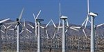 A wind turbine farm with several wind turbines